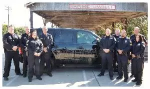 police force next to the SUV