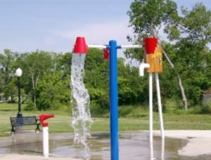 red buckets pouring on wet cement